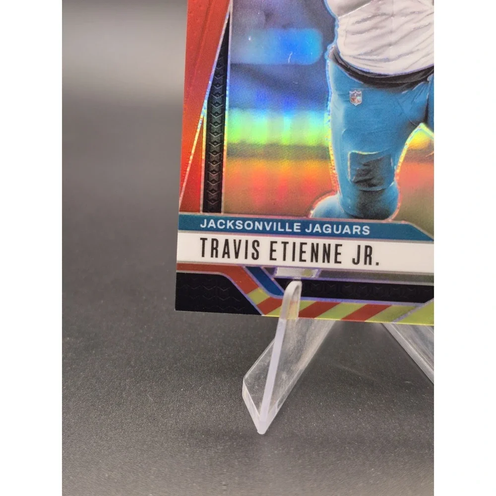 2024 Panini Prizm Travis Etienne Jr. #130 Red & Yellow Prizm /44 Jaguars